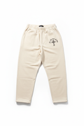 Cream loose pants with logo